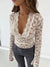 Langärmliges spitztop - elegante bluse für besondere anlässe